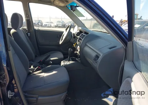 2000 Chevrolet Tracker Hard Top из США, поврежденный, VIN 2CNBJ13C4Y6950944